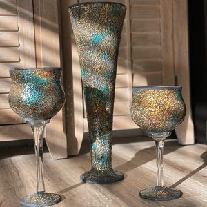 3 glass accent decor. Multicolored one vase and two candle holders
